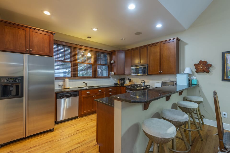 Kitchen with dishwasher & Drip-style coffeemaker.