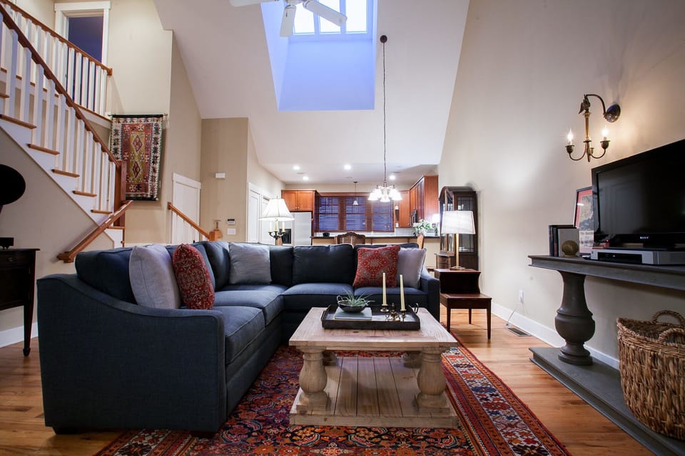 Living room with gas logs fireplace & TV (cable + DVD player).