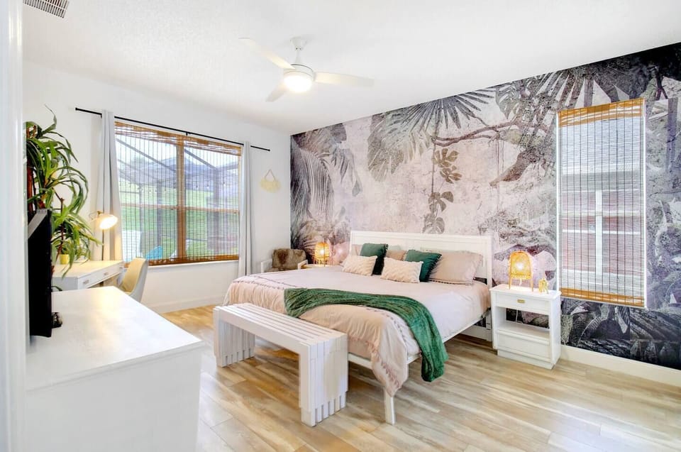 This room was inspired by the jungle cruise at the Magic Kingdom. It features and en suite master bath with soaker tub and standing shower!