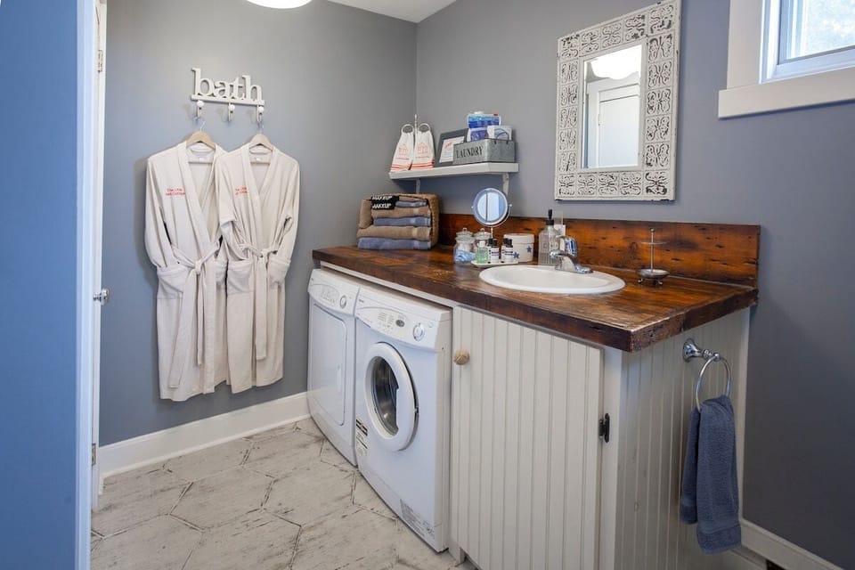 Washer & Dryer in the bathroom.