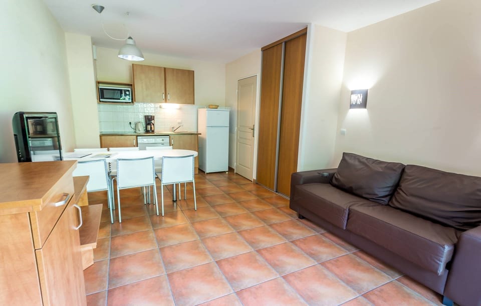 Prepare delicious meals for your friends and family in your personal kitchenette and enjoy your meals in the dining area with seating for your group.