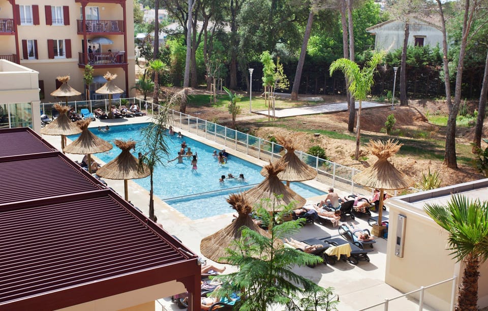 Spend time with family and friends in the outdoor pool during the summer.