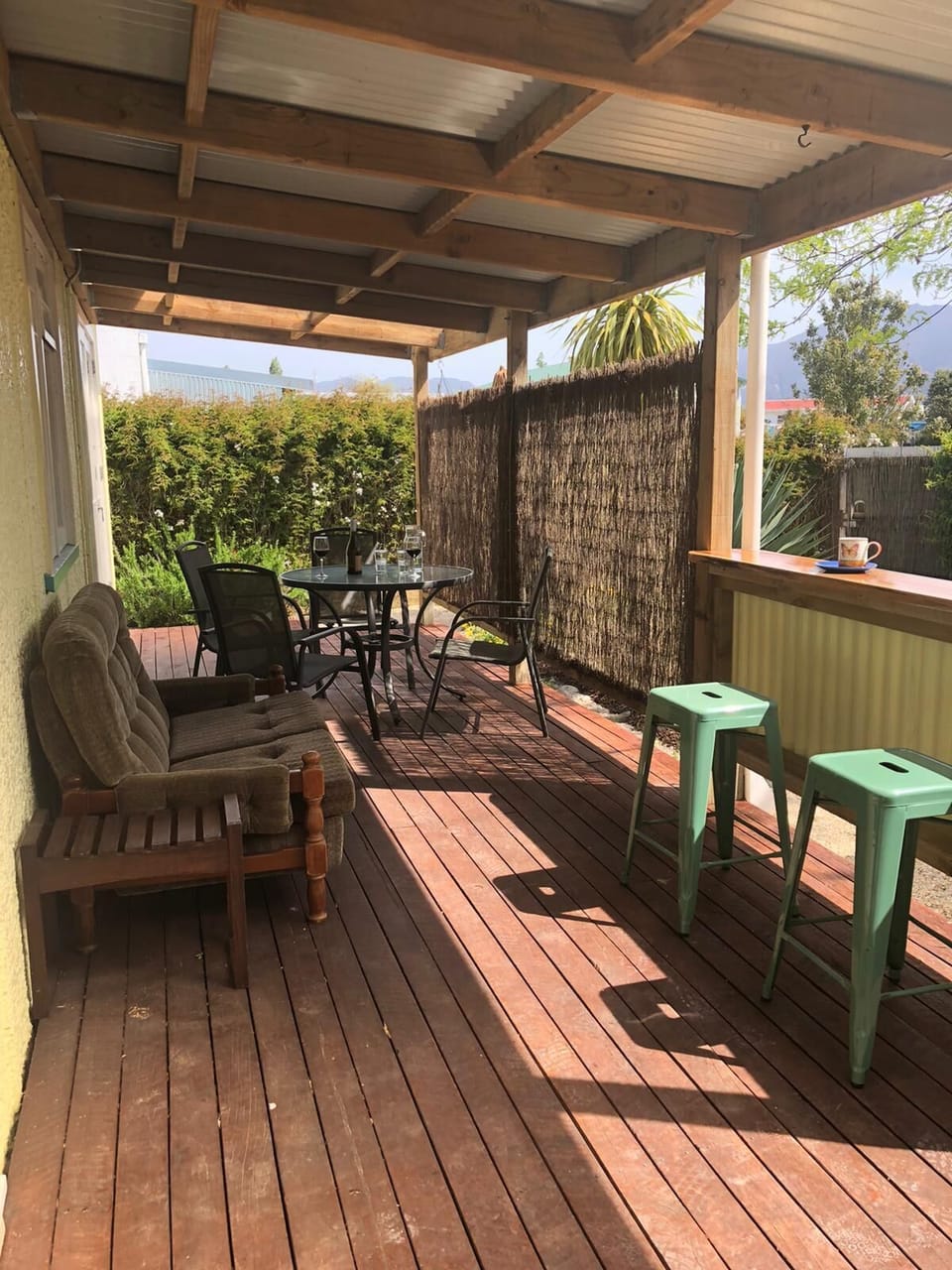 Covered deck with BBQ and breakfast bar.