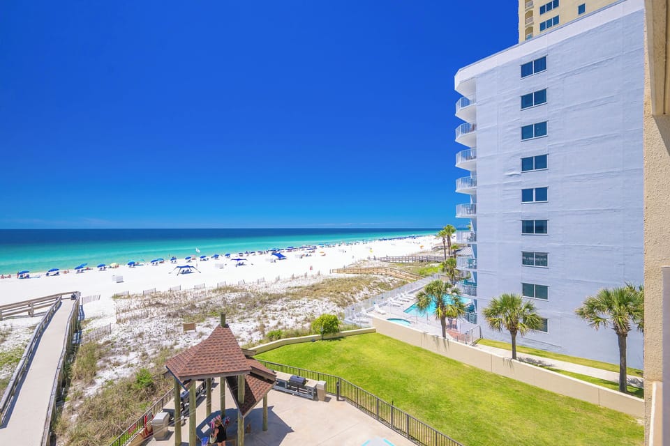 Watch the coastline stretch into the distance and the horizon meet the sky from your balcony while you soak up the sun