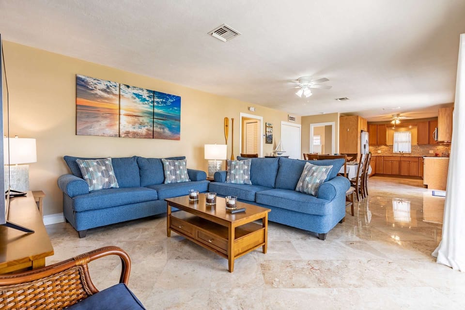 Experience open-concept living that seamlessly connects the kitchen to the living room.