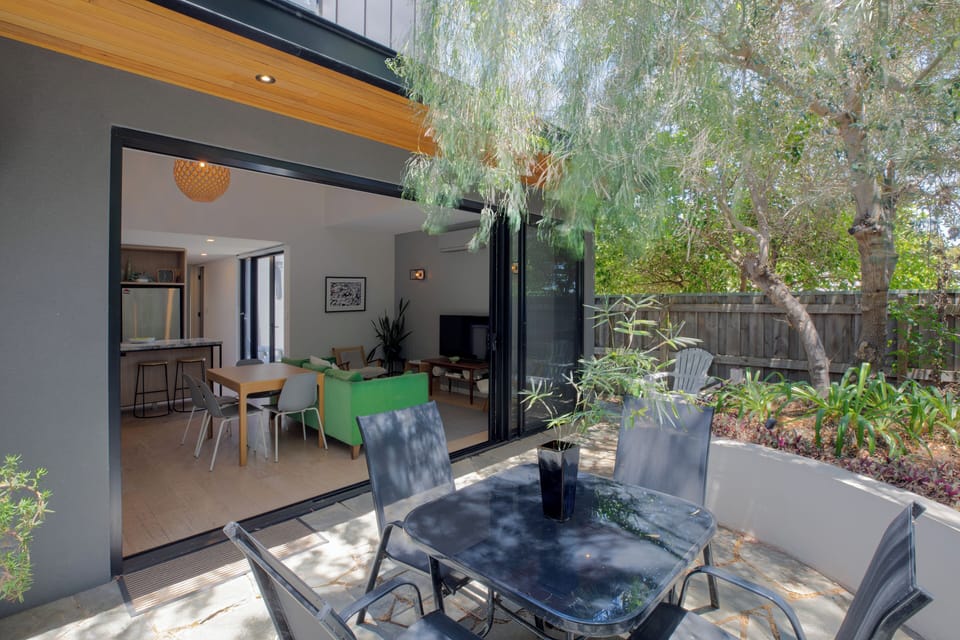 The sitting courtyard features native peppermint and olive trees providing shade