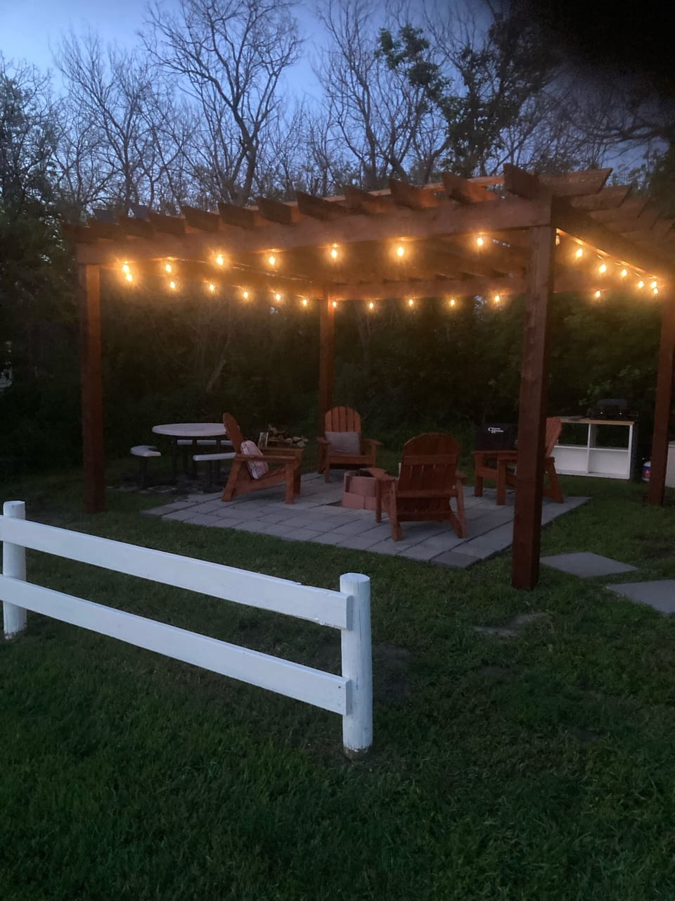 Pergola at the cabin for the fire pit.  Lovely lights at night 