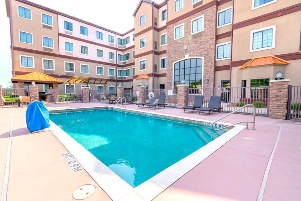 Enjoy our outdoor pool in Houston near IAH