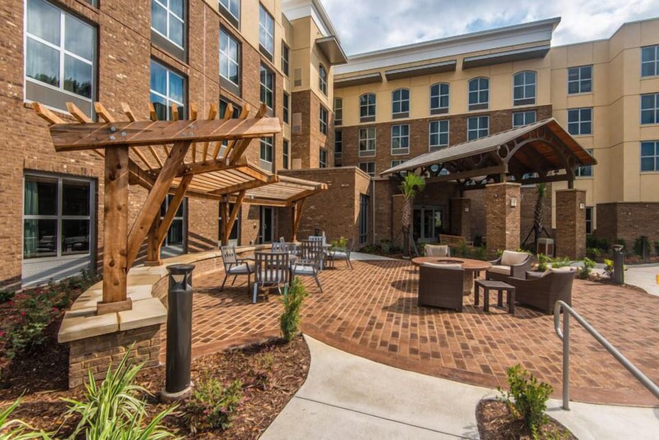 Outdoor patio area with comfortable seating, ideal for relaxing in the South Carolina sunshine.