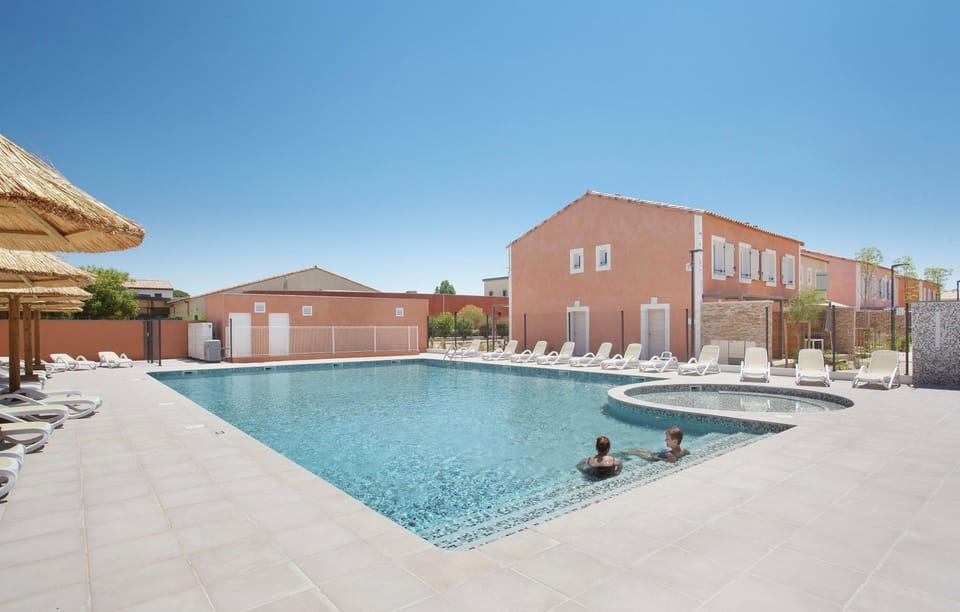 Lounge by the pool in the sunshine.