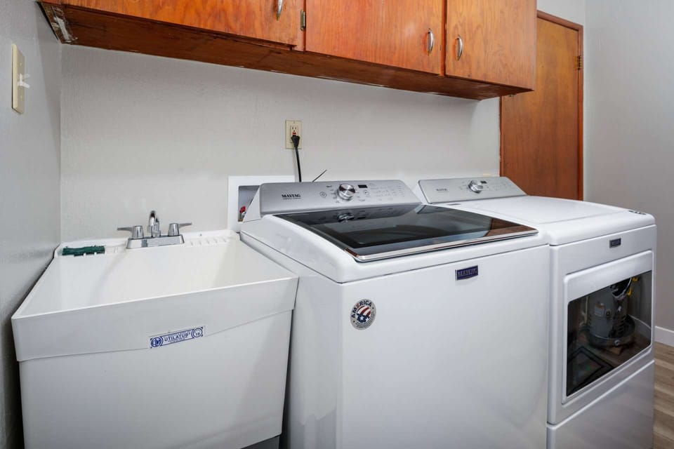 This rental has an up to date washing machine and dryer for guest use.