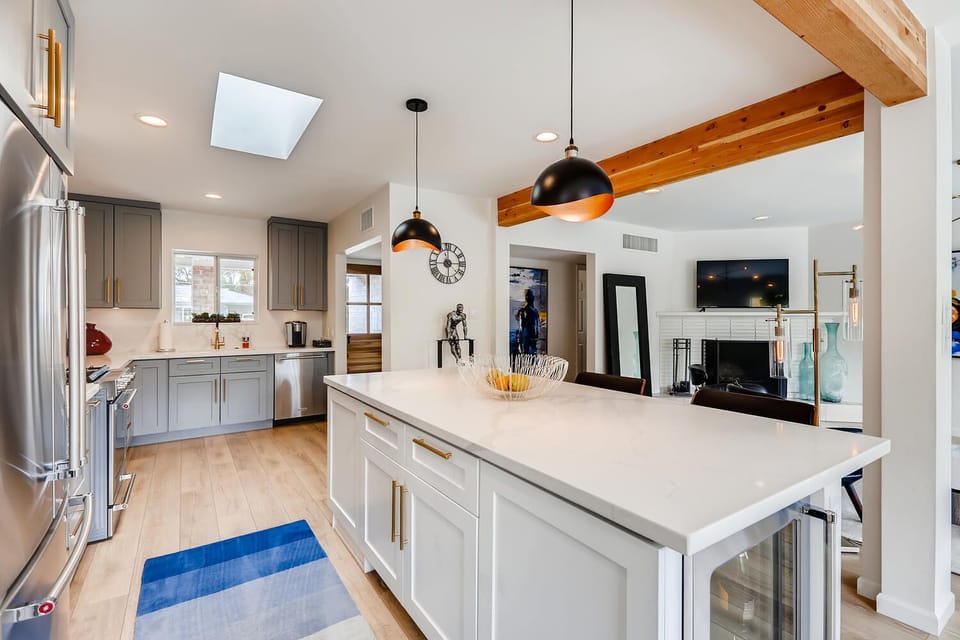 Breakfast bar with wine cooler and views and access to the pool