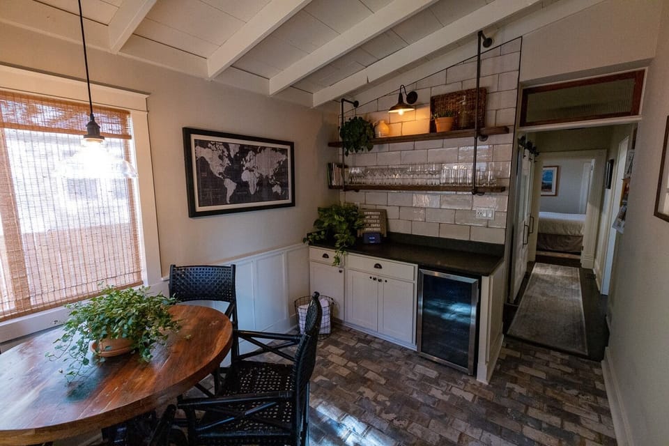 Gameroom is off the patio entrance with built-in mini-fridge  