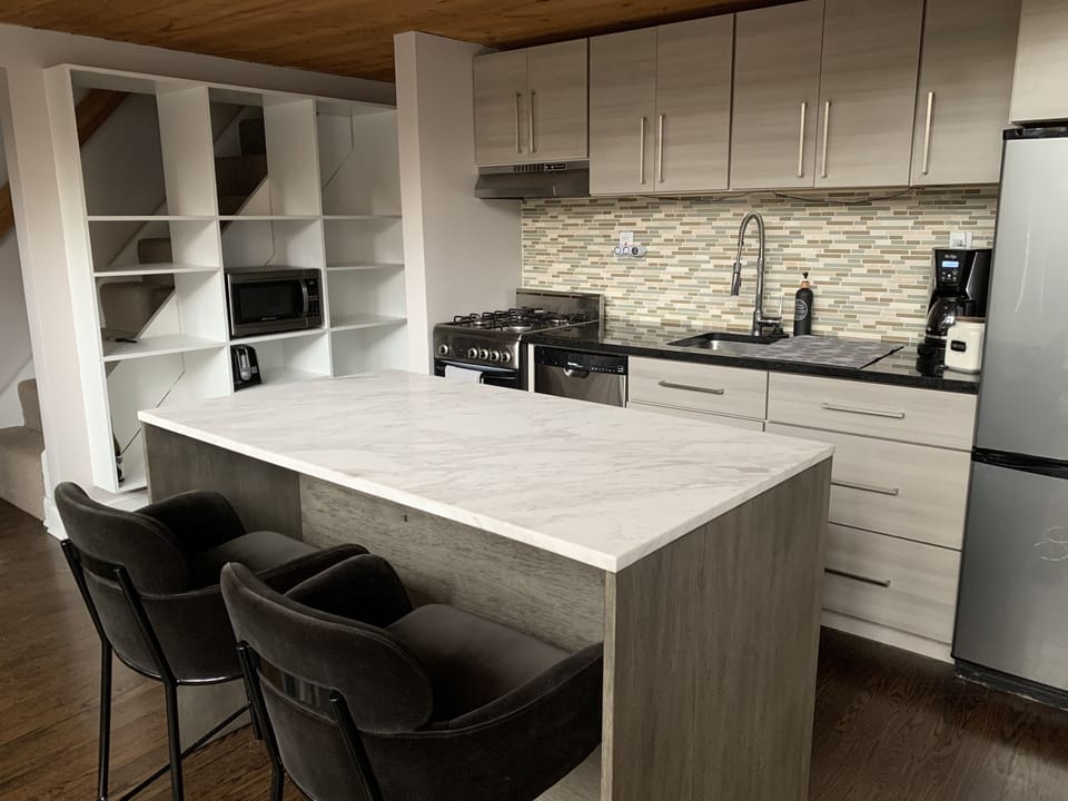 Enjoy breakfast (or cocktails) at the kitchen island
