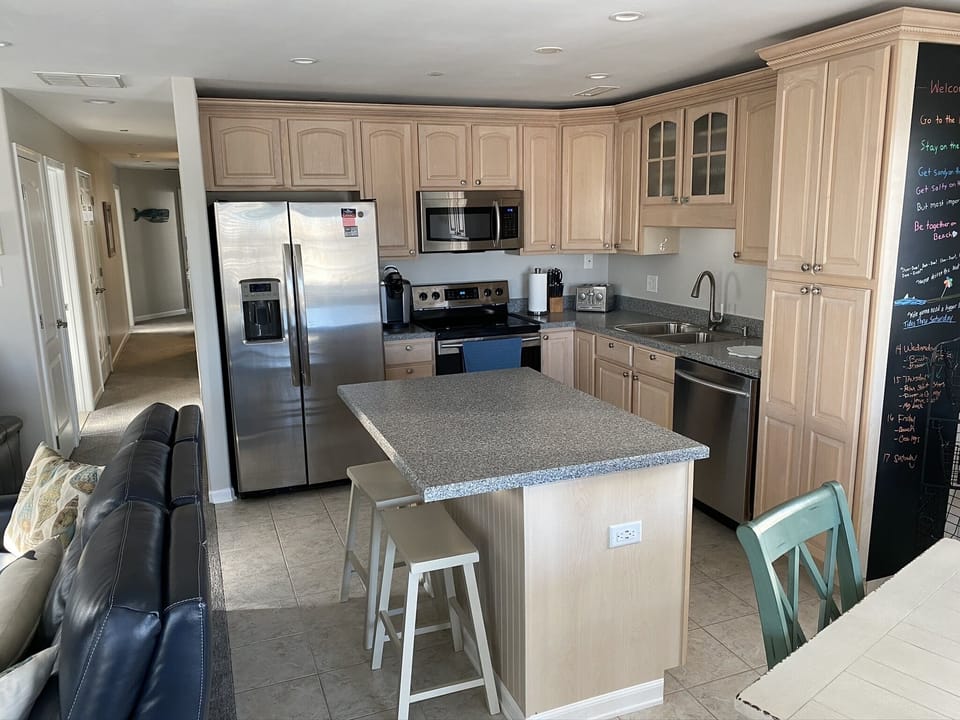 View of kitchen and counter seating