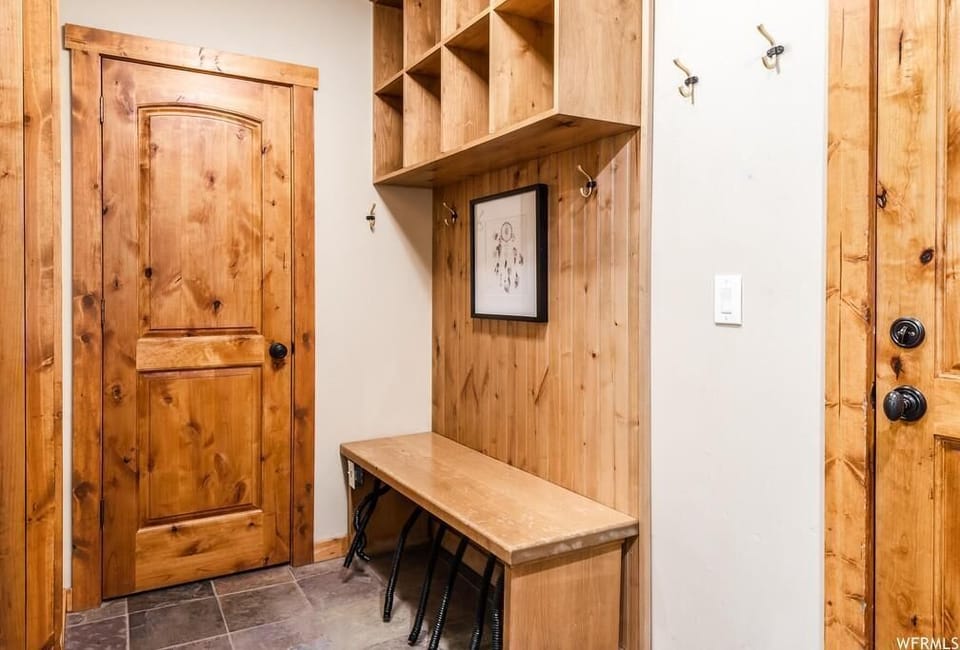 Mudroom with storage and boot warmer