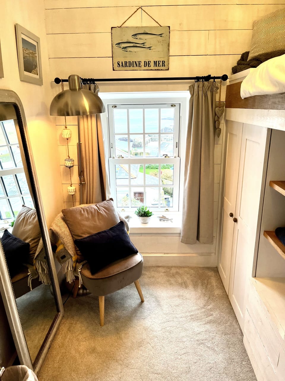 Bedroom 3. Please note the elevated bed, which is accessed via a ladder.