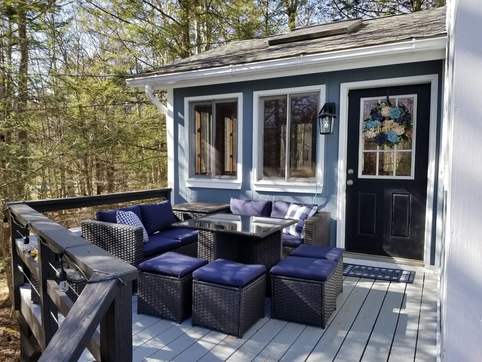 seating for 8 people around the table. New Trex decking put down