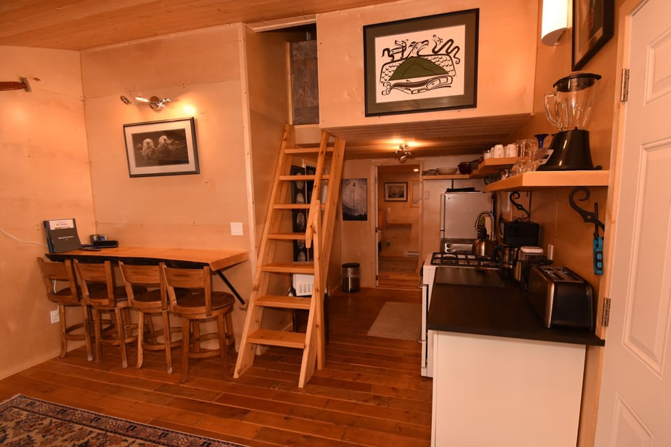 Bar, stairway to 2nd bedroom  and kitchen