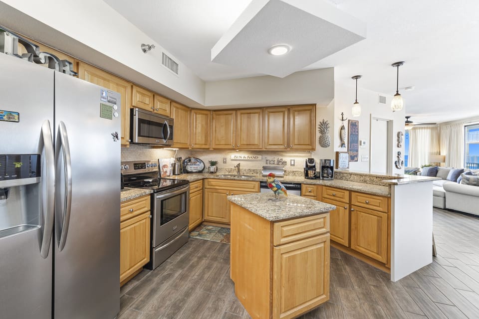 Updated Kitchen with Stainless Steel Appliances, Granite Counter Tops and a Breakfast Bar
