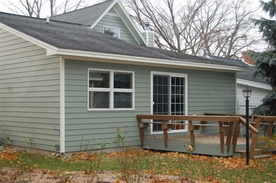 Deck, grill, fenced in yard, rose garden, and a wagon for going to the beach.