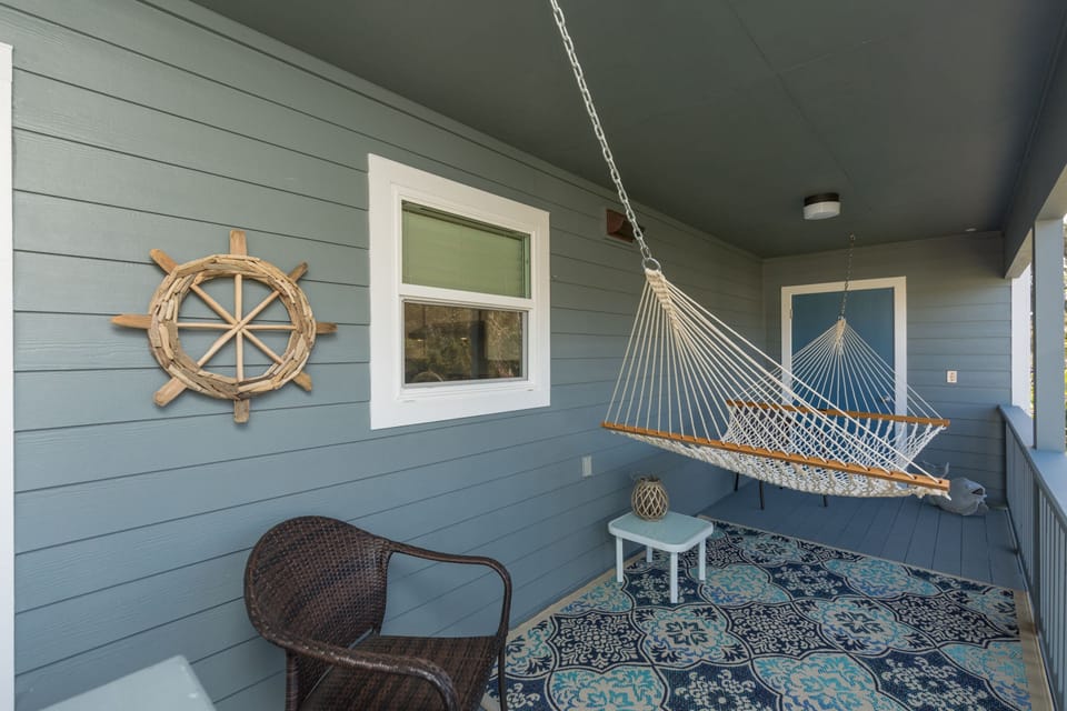 Take a nap or read a book in the hammock and listen to the waves.