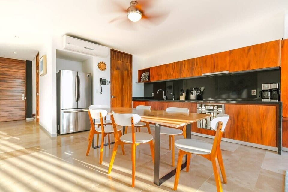 The dining space and large kitchen is perfect for gathering after a long day.