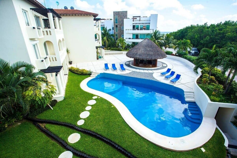 View of the pool and lounging area.