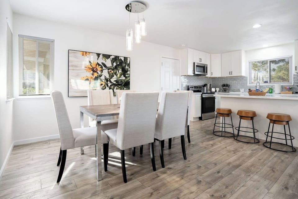 Another view of the dining area and kitchen.