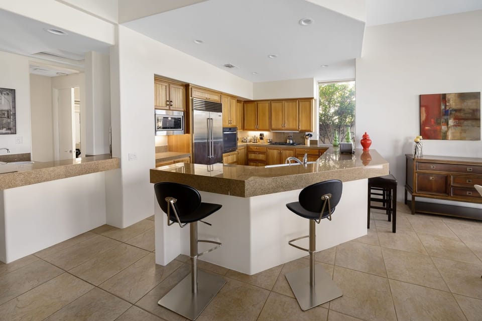 Looking into kitchen - wet bar on left.