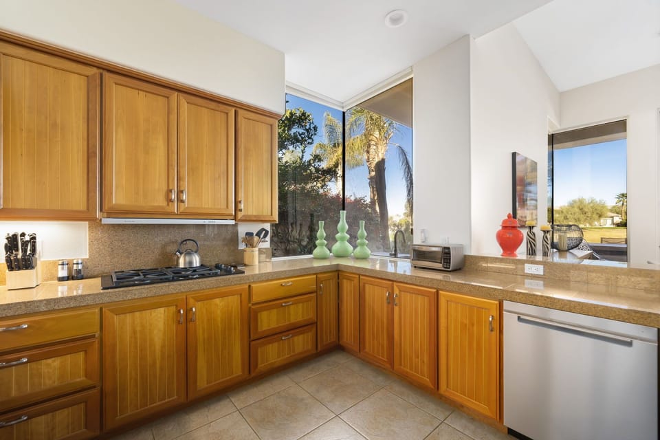 Kitchen with corner glass out to golf course.