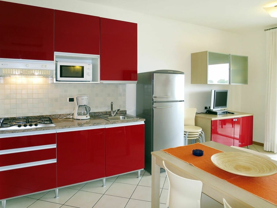 Room, Countertop, Cabinetry, Kitchen, Property, Furniture, Red, Interior Design, Orange, Sink