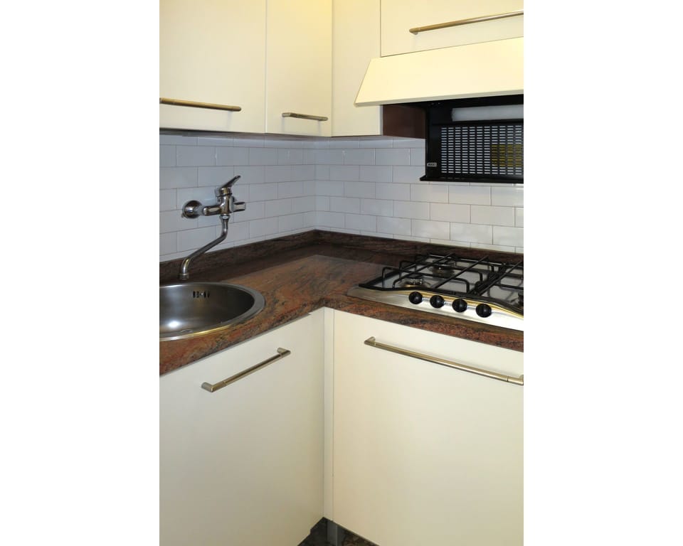 Countertop, Kitchen, Property, Room, Cabinetry, Sink, Major Appliance, Kitchen Sink, Furniture, Gas Stove