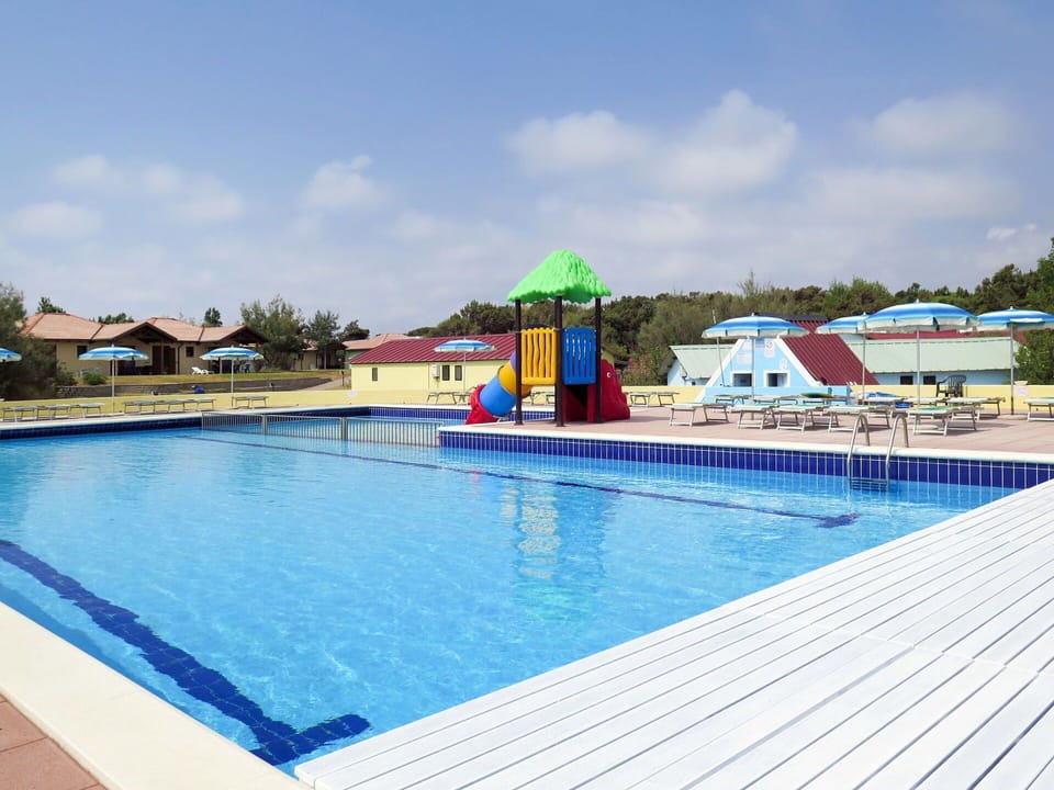 Water, Sky, Swimming Pool, Cloud, Building, Outdoor Furniture, Shade, Tree, Leisure, House