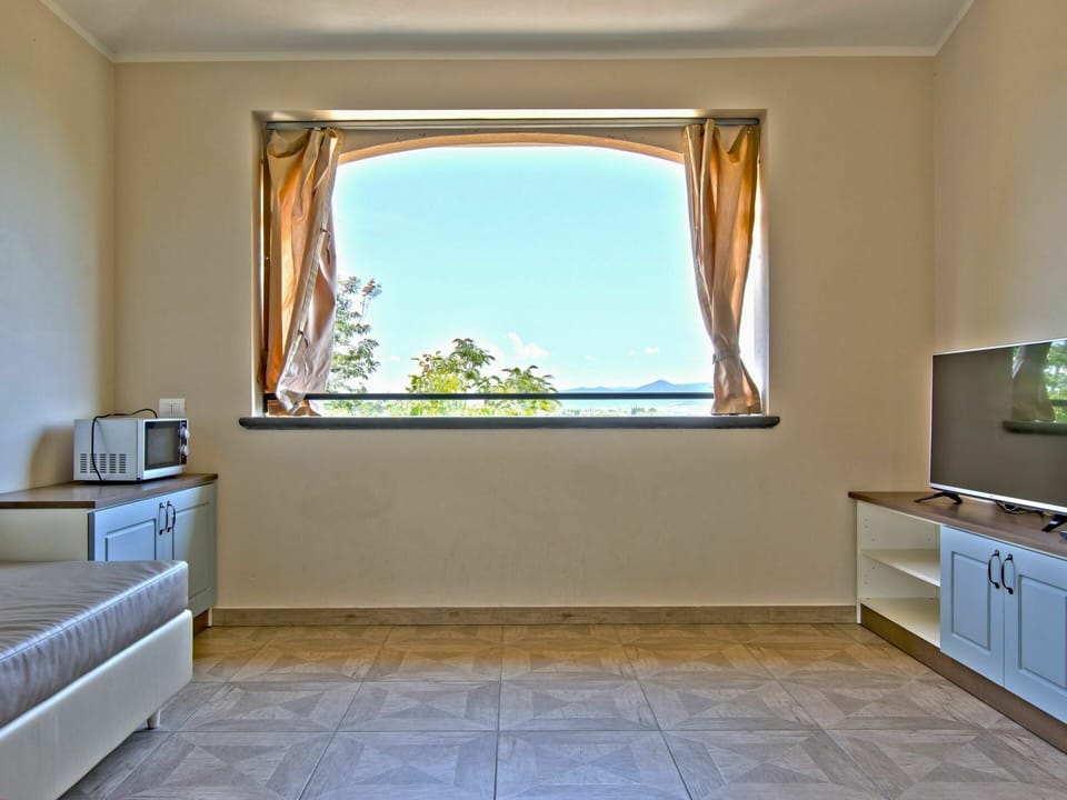 Room, Property, Floor, Furniture, Building, Interior Design, Tile, Yellow, Daylighting, House