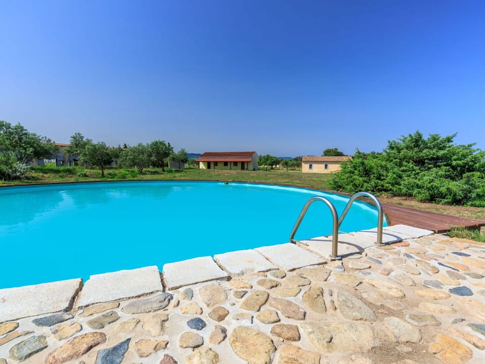 Water, Sky, Water Resources, Swimming Pool, Azure, Tree, Plant, Natural Landscape, Rectangle, Building