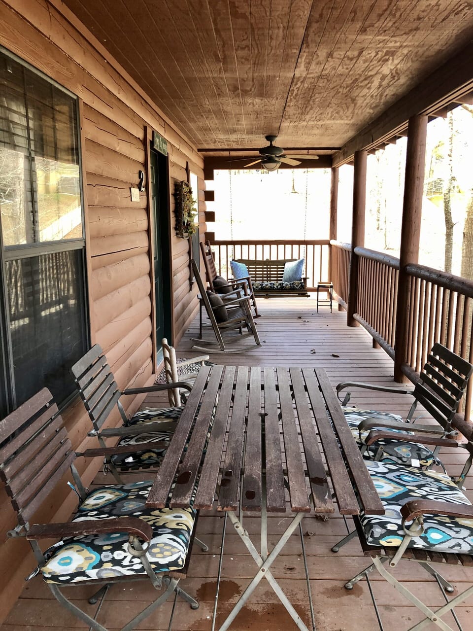 Amazing porch for relaxing and grilling!  Don’t forget charcoal for the grill.