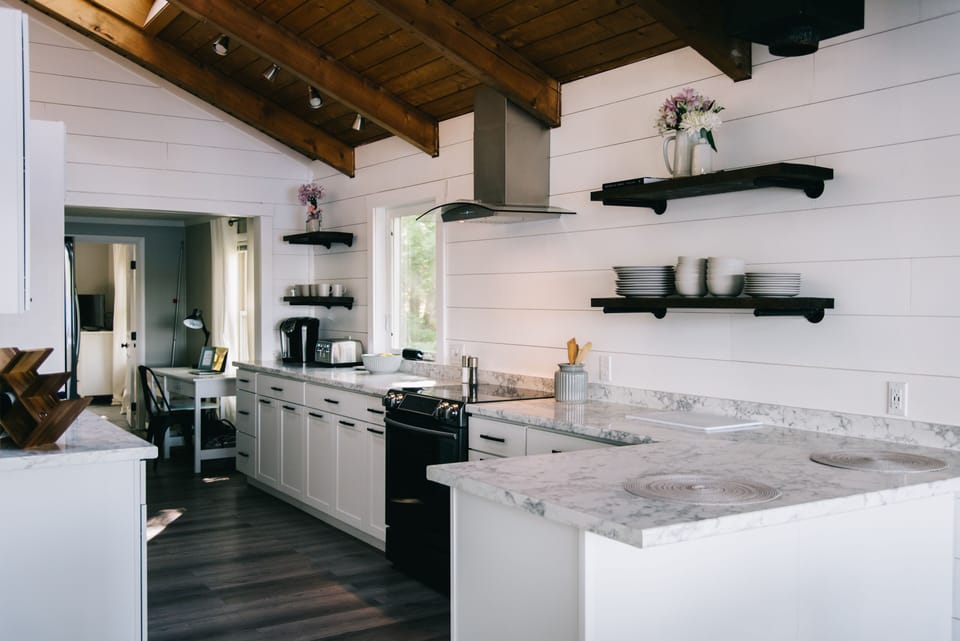 Spacious kitchen with plenty of prep space, oven, microwave, dishwasher & more.