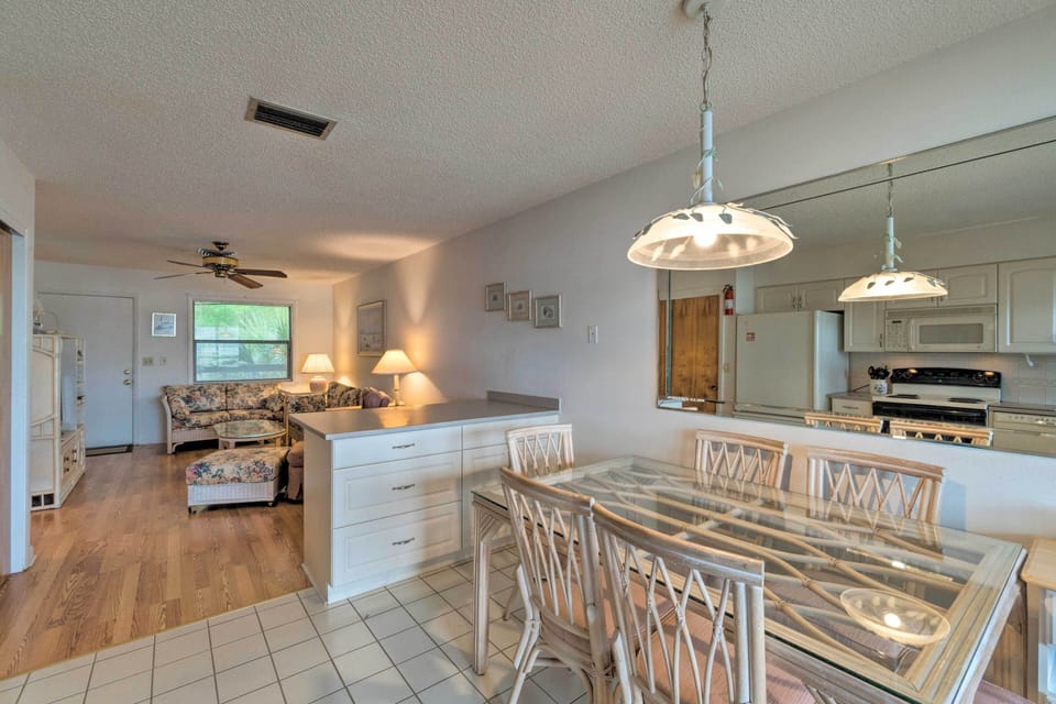 The open floor plan connects the living space and kitchen area.