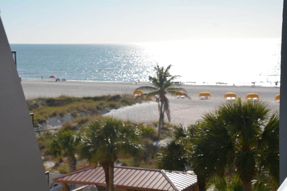 Sitting on the balcony to watch the beach activity