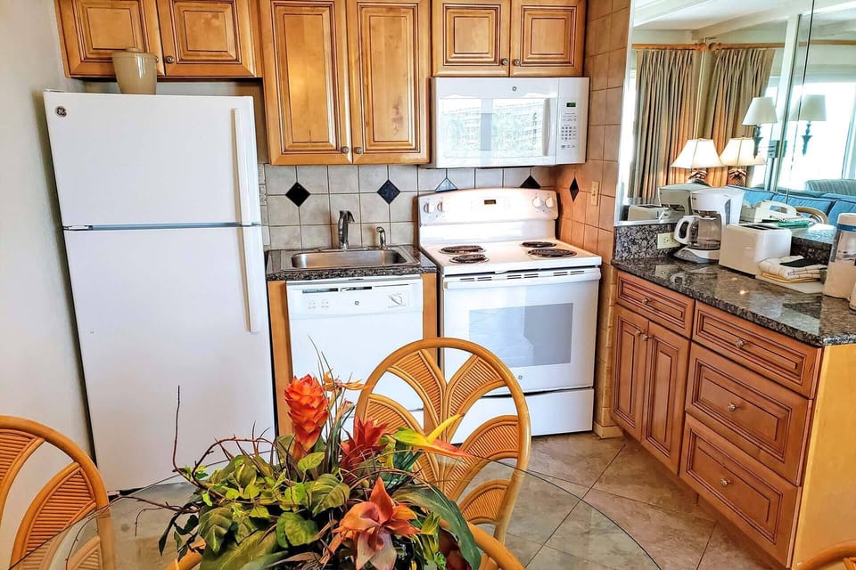 Full Kitchen with all the necessities to cook a meal.