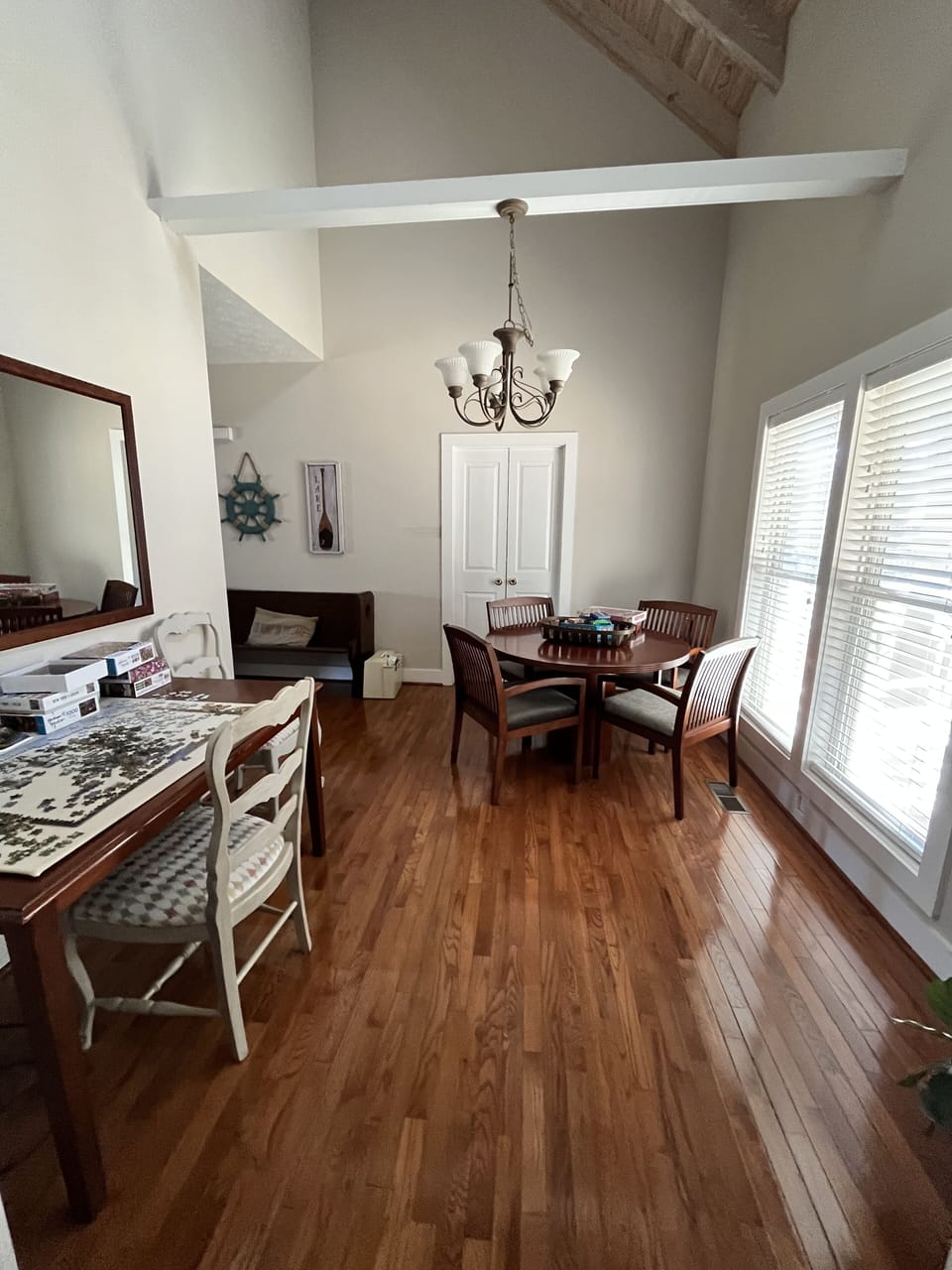 Game room with additional TV; table for games and cards; & puzzle table.