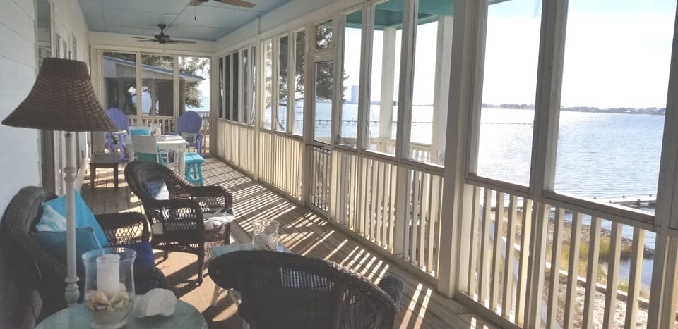 You can't beat this view from the huge waterfront screened porch.