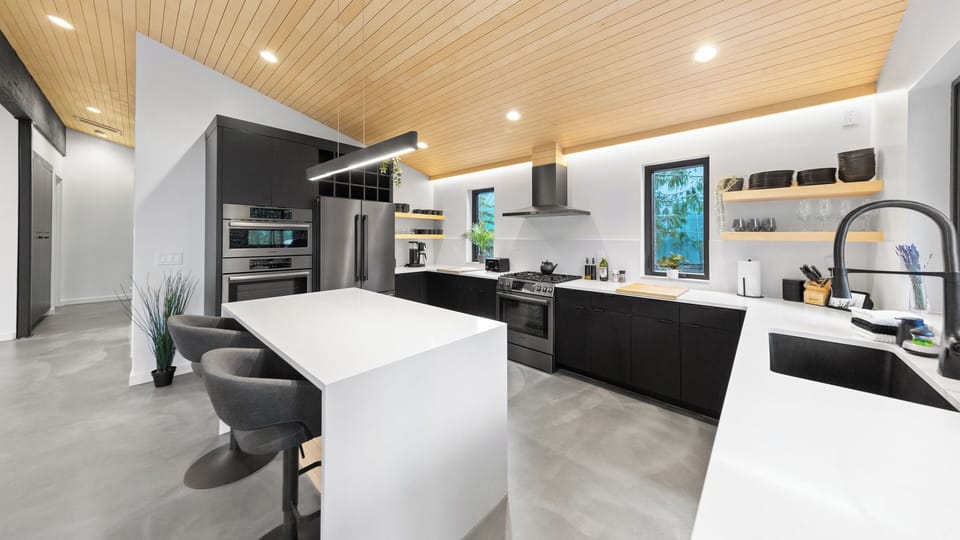 RAVN HAUS - Canopy - Kitchen Island Sink Range Fridge Oven Wine Glasses _ VRBO