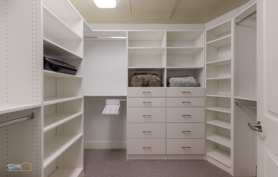 The master closet is built out with tons of space