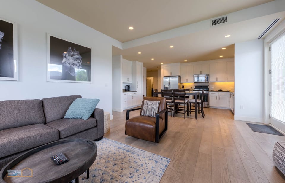 Great room concept with kitchen and living room