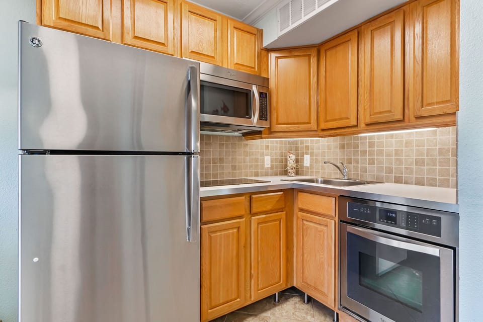 Kitchen fully equipped - Refrigerator; Oven; Microwave; Induction Cooktop