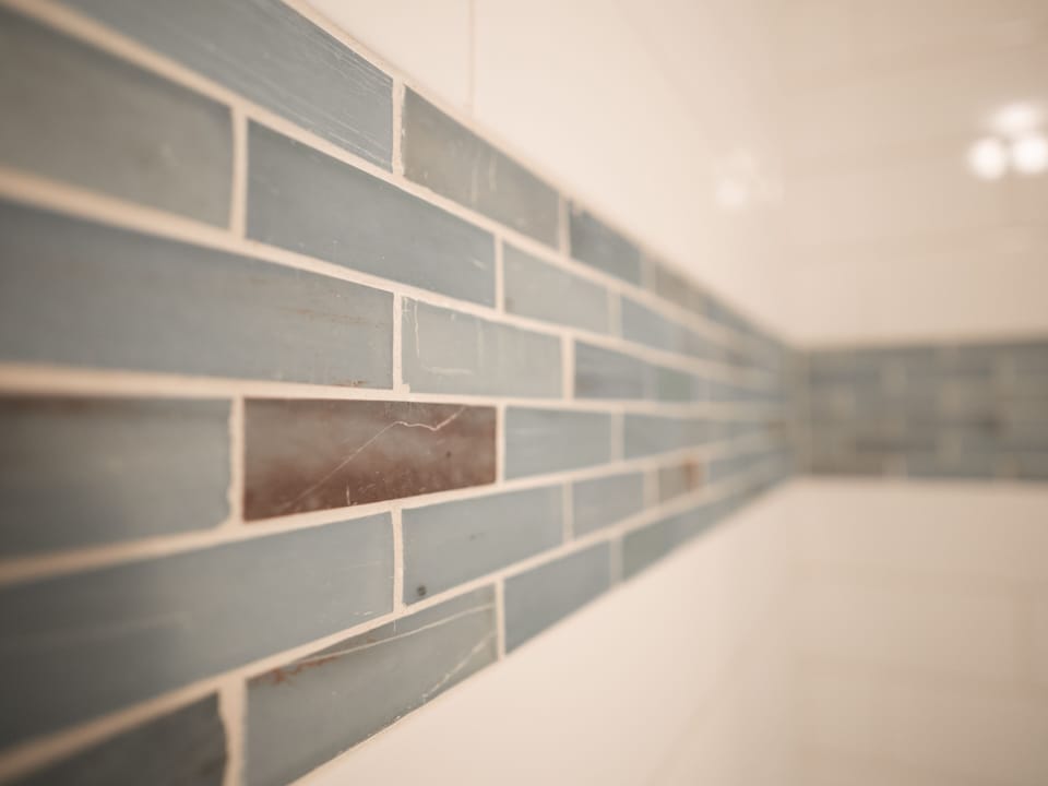 Beautiful tile work in master bathroom.