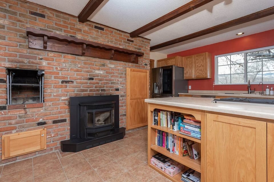 Two sided pellet fireplace that will not only warm you up but the entire home as well.