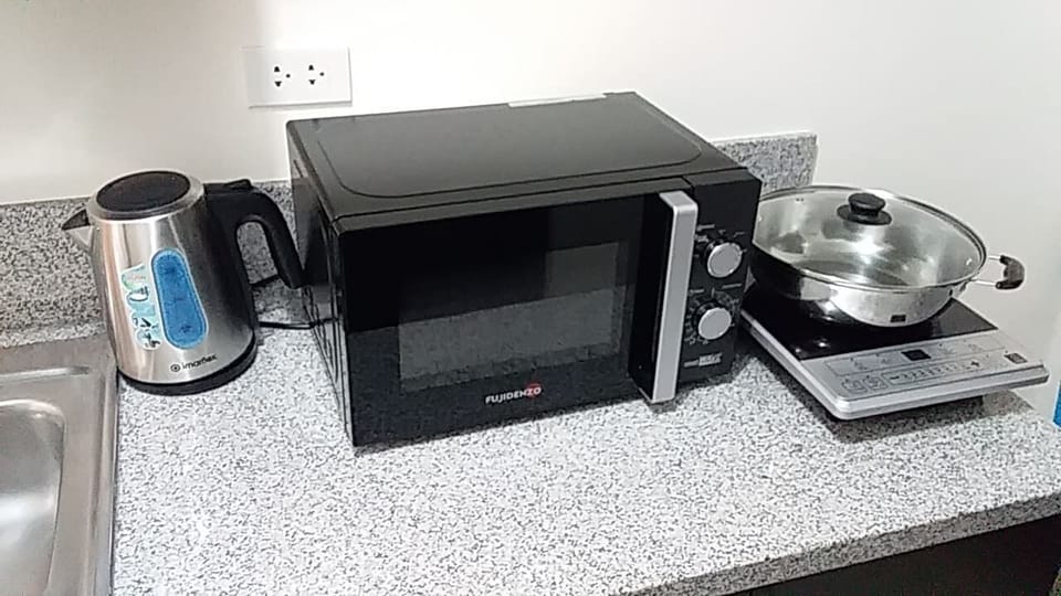 Electric Water Heater,Microwave and Induction Hob.